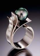 Fiore del Mare ring 10.5mm Tahitian Pearl, 0.35 carats total of VS G diamonds in 14kt white gold. ADAM NEELEY