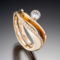 Grace and Covet ring set .33 carat center diamond and 21 pavé set diamonds in 14kt yellow gold. ADAM NEELEY
