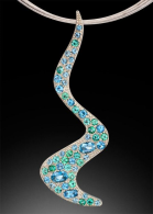 Mod pendant aquamarine and blue green tourmaline set in 14kt gold. ADAM NEELEY