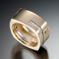 Quattro Ring,0 .06 ctw F-G VS diamonds with 14kt white and yellow gold. ADAM NEELEY