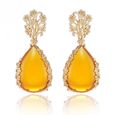 #CHOPARD #Earrings #18k gold #titanium #Yellow diamonds #White diamonds #Fire Opal #Opale de feu #Diamants jaunes #Diamants blancs #2016 #Red Carpet collection