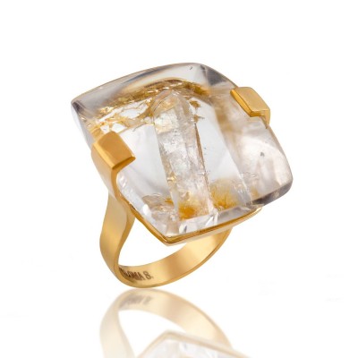 PALOMA SANCHEZ Unusual crystal embedded in a quartz crystal with rutile needles