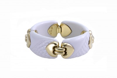 #BULGARI #A bracelet in 18kt yellow gold and white porcelain. Signed Bulgari, from the “Chandra” collection, circa 1990.